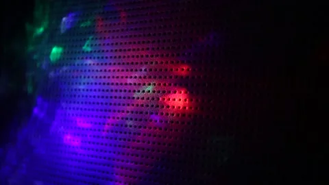 On a dark blue background to a black dot the flickering of multicolored rays Stock Footage 143848919