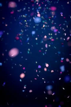 Dark blue background with confetti Stock Photos
