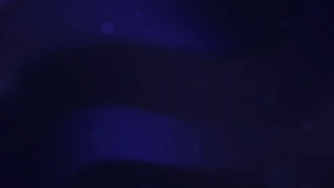 Dark blue background features blurry lights resembling bokeh Video stock 296935263