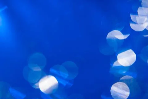 Dark blue background with light effects and lens flares Stock Photos