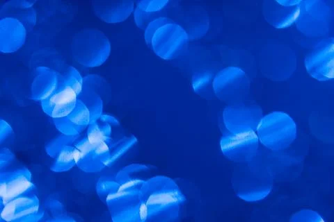 Dark blue background with light effects and lens flares Foto stock