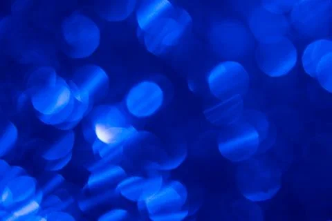 Dark blue background with light effects and lens flares Stock Photos