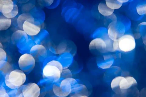 Dark blue background with light effects and lens flares Foto stock