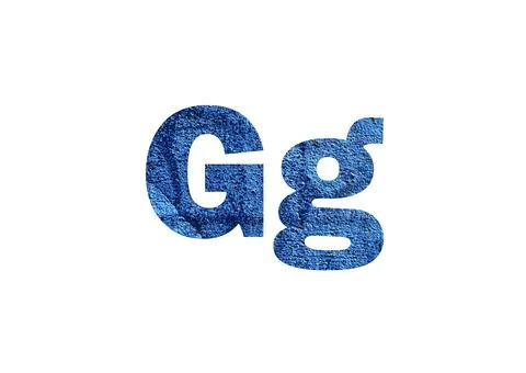 Dark blue background. Shot through the cut-out silhouette of the letter G Stock Photos