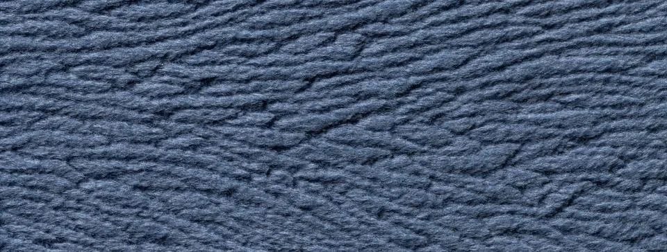 Dark blue background from soft fluffy textile material macro. Texture of navy Illustrazione stock