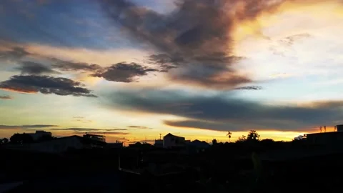 Dark blue clouds with golden yellow and white ground. Stock Footage 159521307