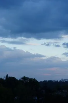 Dark blue cloudy sky background Stock Photos