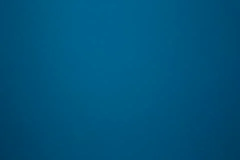 Dark blue color on a solid stone wall as background texture. beautiful modern Stock Photos