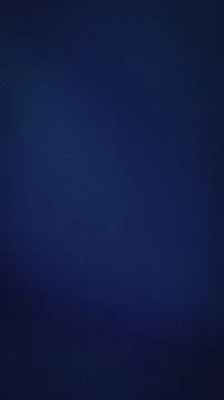 Dark blue grainy blurred vertical background with rich navy and midnight bl.. Stock Photos