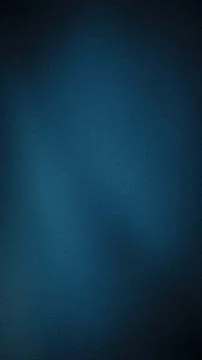 Dark blue grainy textured vertical background with black gradient blur grun.. Stock Photos