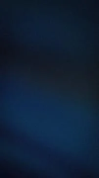 Dark blue grainy textured vertical background with shades of black and navy.. Stock Photos