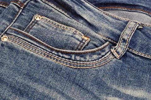 Dark blue jeans background Stock Photos