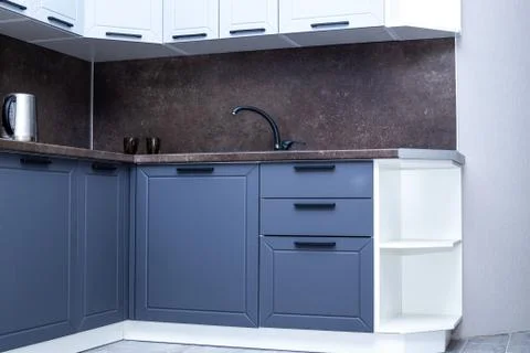 Dark blue kitchen bottom corner units. Room interior Фото