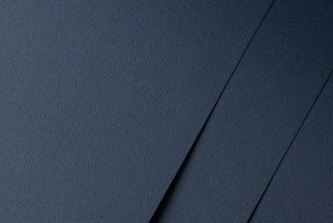 Dark blue matte paper texture with an elegant, minimalistic finish. Simple Stock Photos
