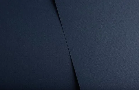 Dark blue matte paper texture with an elegant finish, featuring simple geom.. Stock Photos