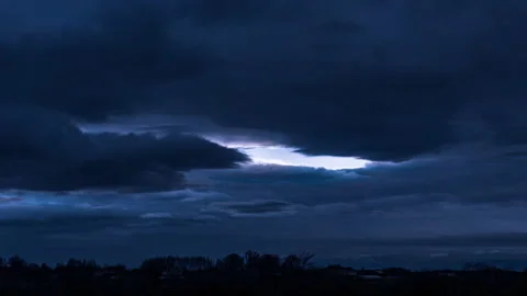 Dark Blue Menacing Clouds Over Forest Stock Footage 168677076
