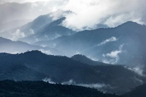 Dark blue mountain range in winter Stock Photos