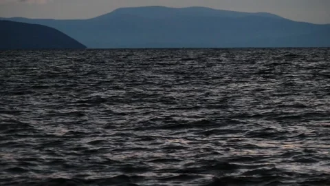 Dark blue mysterious waves of the night lake. Stock Footage 292872680