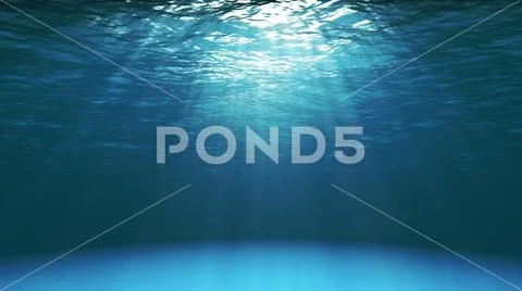 Dark blue ocean surface seen from underwater Stock Photos