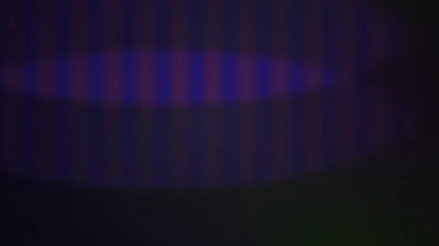 Dark blue oval shape with purple stripes on black background. Stock Footage 336227798