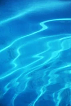 Dark blue pool water Stock Photos