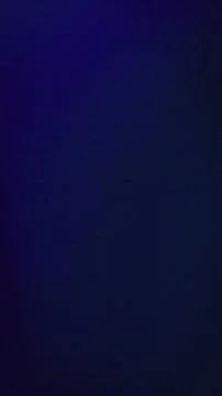 Dark blue purple navy gradient grainy abstract vertical background for tech.. Foto stock