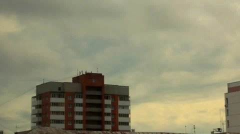 Dark blue rainy clouds over apartment house in summer evening Stock Footage 50965908