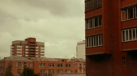 Dark blue rainy clouds over apartment house in summer evening Video stock 50966140