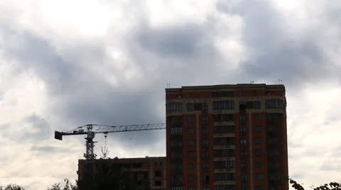 Dark blue rainy clouds over apartment house in summer evening Stock Footage 50988002