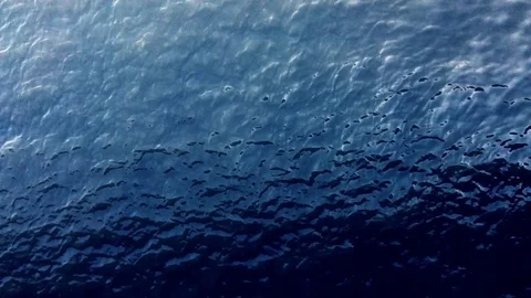 Dark blue sea with soft waves 4K background Stock Footage 82427590