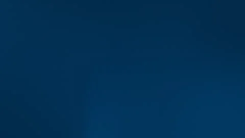 Dark blue seamless loop background with subtle gradient. 4K quality. Stock Footage 300840121