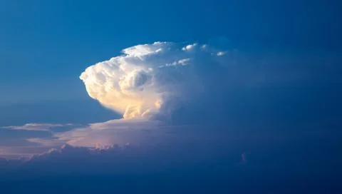 Dark blue sky with a cloud Foto stock