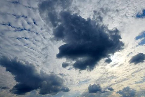 Dark blue sky with clouds for background or texture Photos