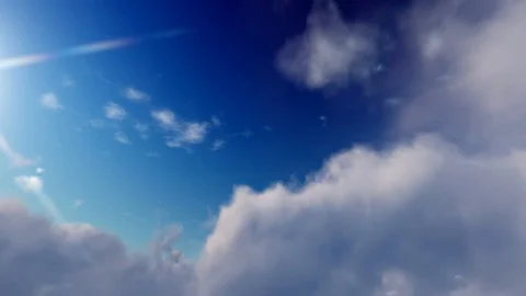 Dark blue sky with fluffy white heavenly storm clouds time lapse seamless loop Видео 93172320
