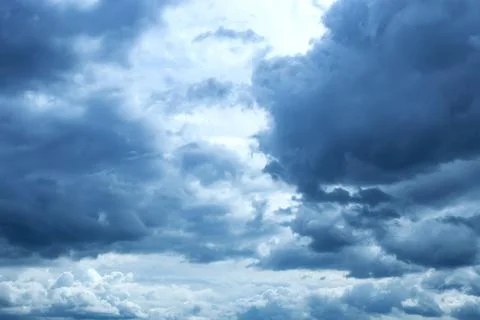 Dark blue sky with soft Cumulus clouds Stock Photos