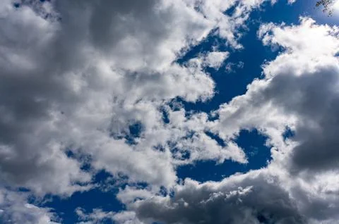 Dark blue sky with white cloud background , blue cloudy sky texture, dark blu 스톡 사진