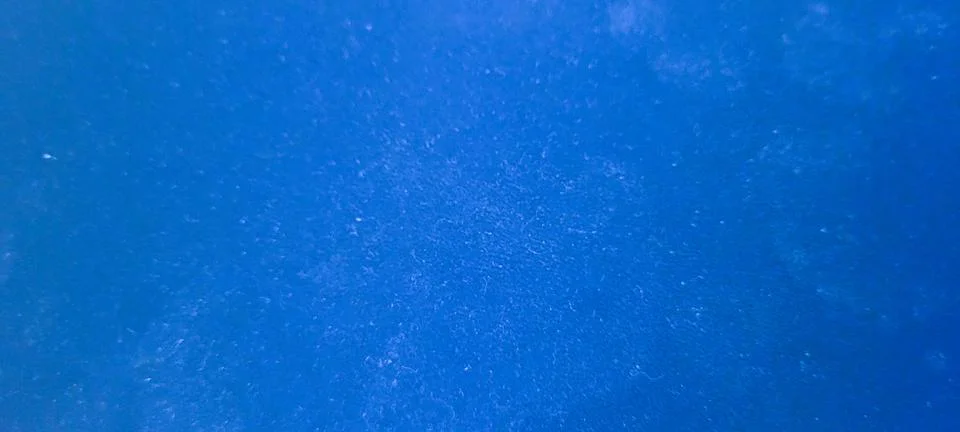 Dark blue textured plaster surface with a soft matte finish. High-resolutio.. Stock Photos