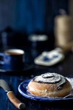 Dark blue themed coffee table Stock Photos