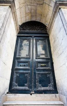 Dark blue threadbare door Stock Photos