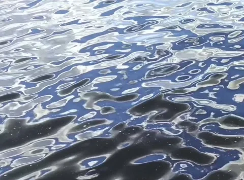 Dark Blue Water Surface with Foam and Reflections Stock Footage 336274855