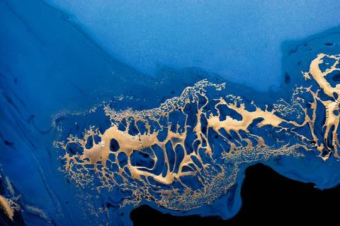 Dark blue waves in abstract ocean and golden inclusion. Liquid acrylic artwork Fotos de archivo