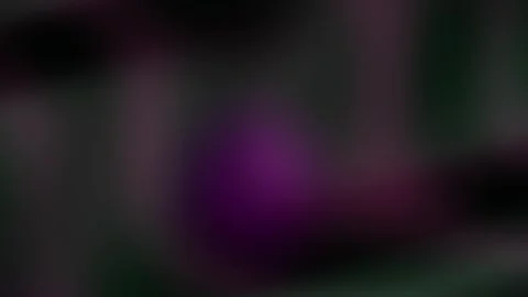 Dark blurred background with purple and green hues. Stock Footage 336227744