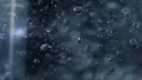 Dark boiling water in slow motion / underwater bubbles rising 스톡 동영상 100877620