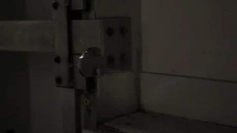 Dark Bolted Gate On Wall Stock Footage 100649838