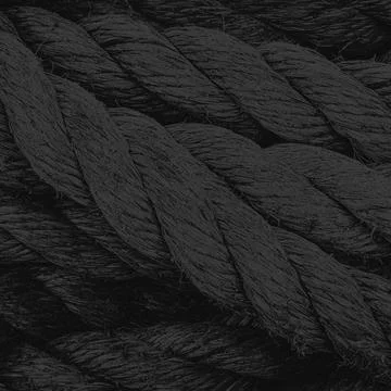 Dark braided rope texture close-up in monochrome style Stock Photos