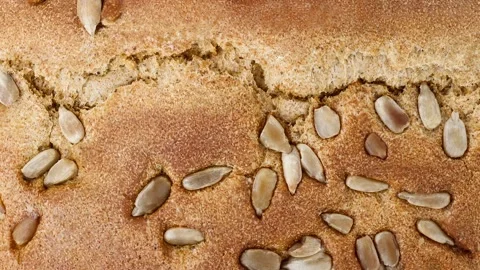 Dark bread with sunflower seeds 스톡 동영상 207801584