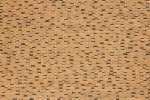 Dark brick wall pattern with chaotic masonry order. Background texture or r.. Stock Photos
