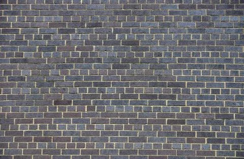 Dark brick wall Stock Photos