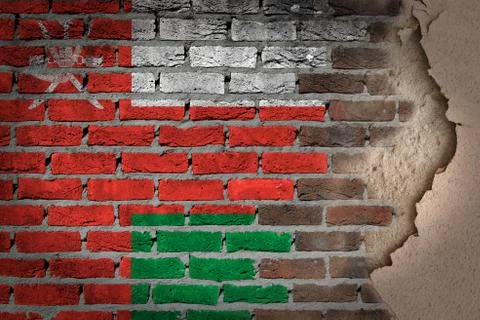 Dark brick wall with plaster - oman Stock Photos