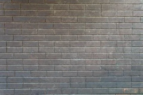 Dark brick wall texture background Stock Photos